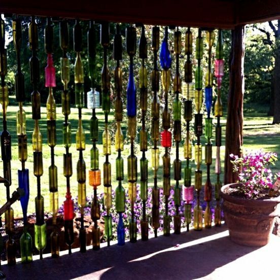 ideias diferentes decorar jardim garrafas vidro