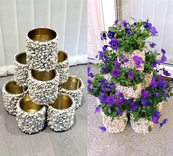 vasos de plantas com latas e pedras 1